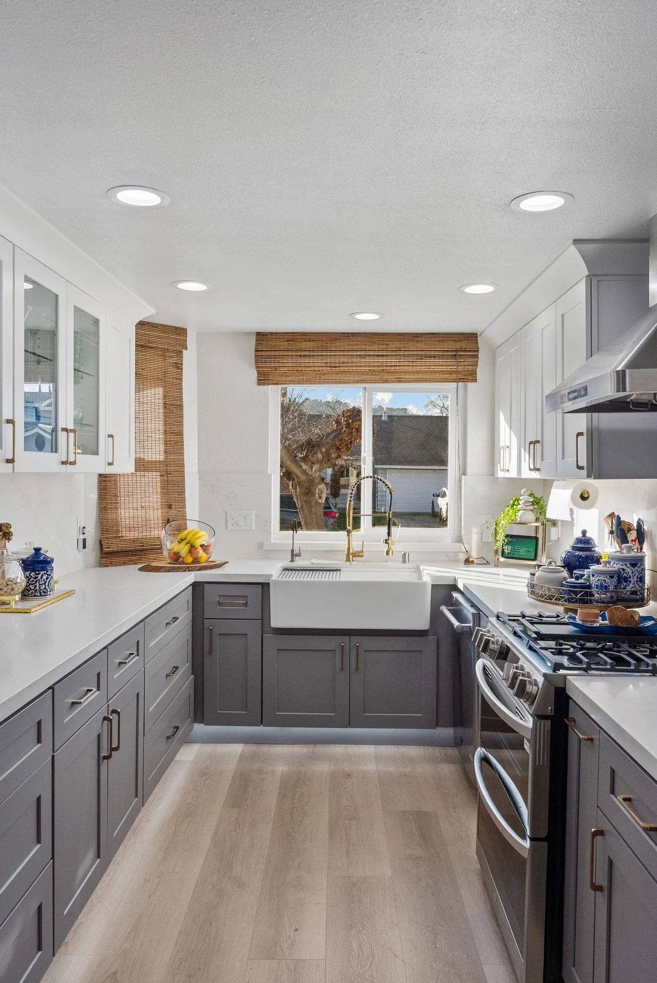 Galley run with an apron-front farmhouse sink below the window